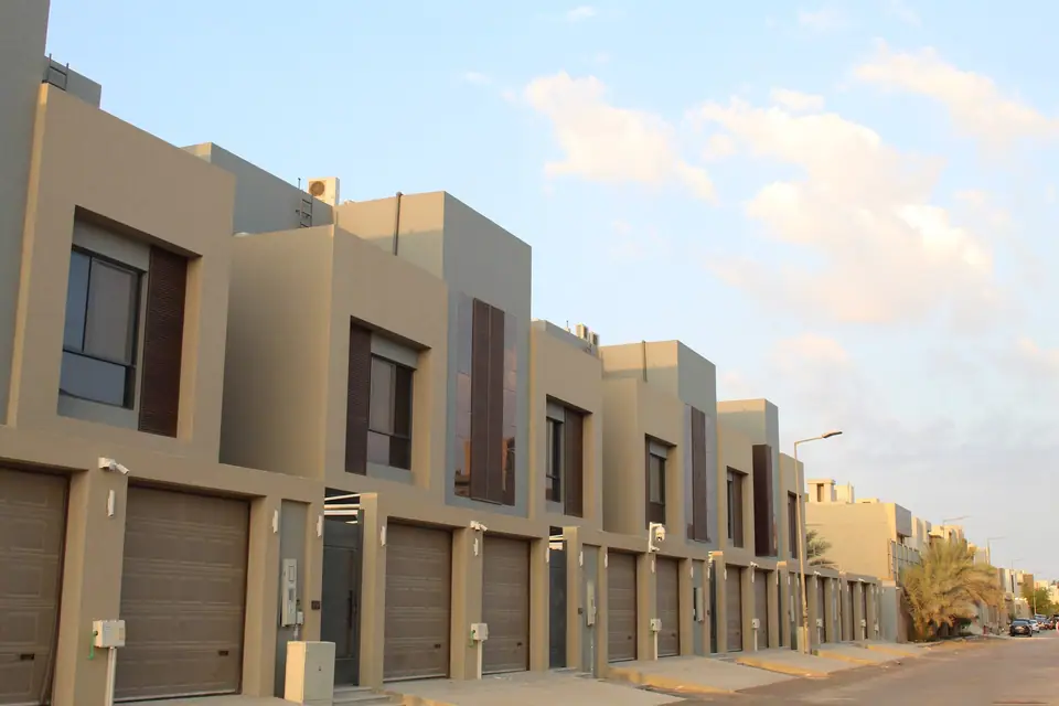 Fay Compound villas and private garages from the street